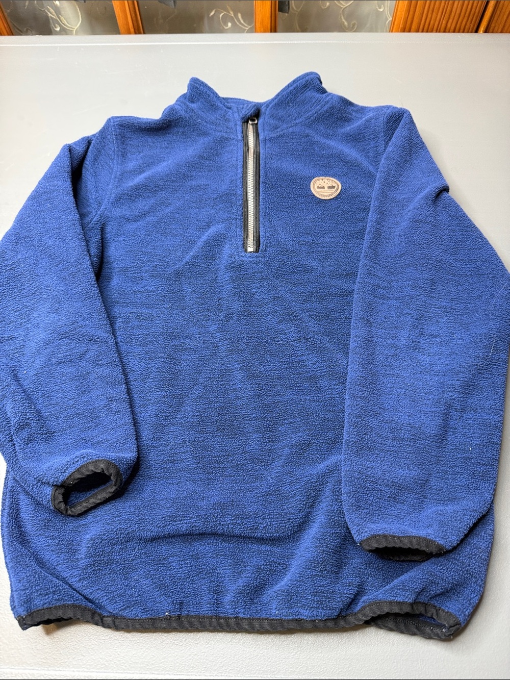 Kid’s Timberland Blue Quarter Zip Fleece Pullover. Size: 7